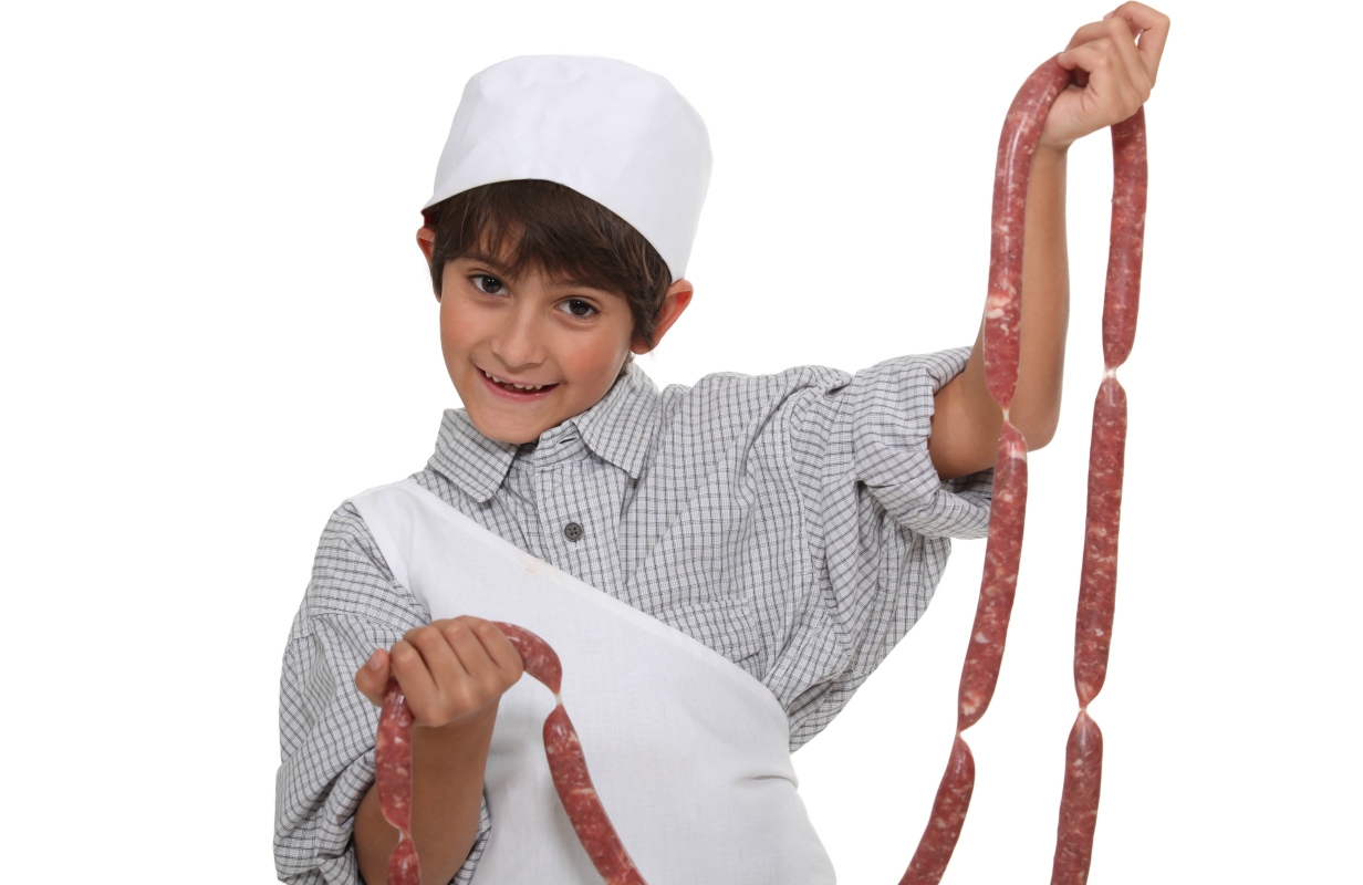 Kid with sausages